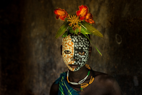 Portrait of a Suri Girl Adorned with Flowers by John Rowe