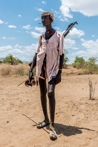Portrait of a Hamer Man with AK-47 #2 by John Rowe