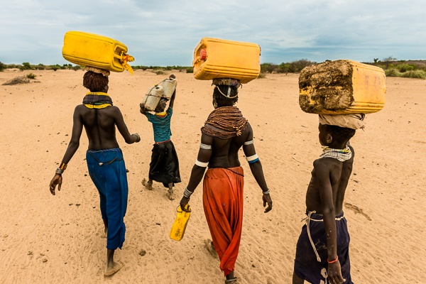 Bringing the Water Home, Nyangatom Tribe by John Rowe