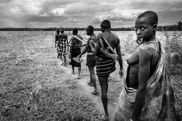 On the Move, Mursi Tribe by John Rowe