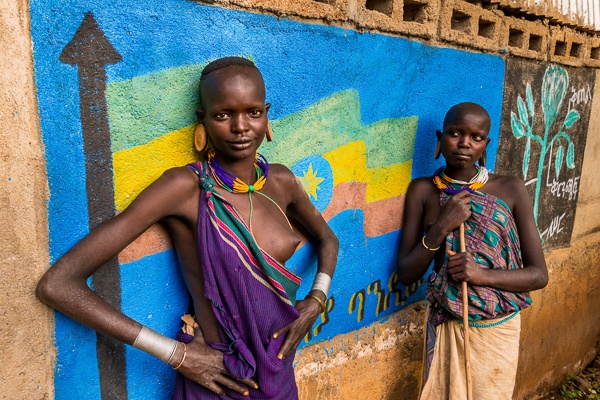 Suri Women and Ethiopian Flag Art by John Rowe