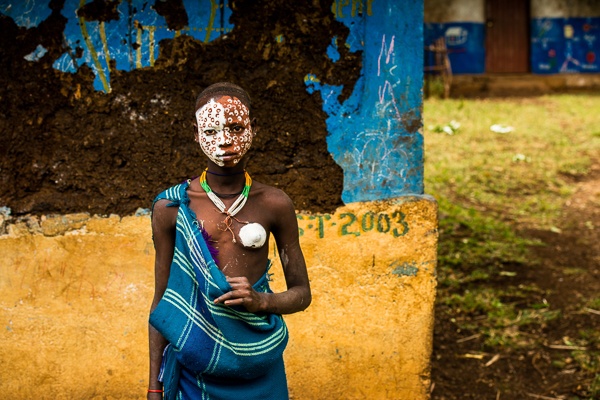 Suri Girl at School House by John Rowe
