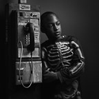 John Carlos as "Skeleton"