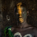 Portrait of a Suri Boy with Orange Clay