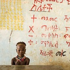 A Young Kara Girl in a School House, Dus Village