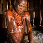 Hami Grinding Her Clay