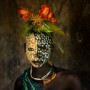 Portrait of a Suri Girl Adorned with Flowers