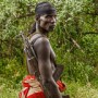 Portrait of a Mursi man with AK-47